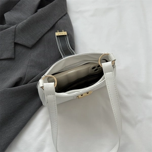 Minimalist white PU leather shoulder bag with spacious interior and gold hardware detail