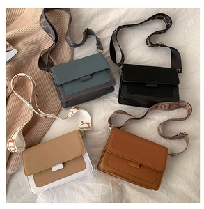 Minimalist flap crossbody bags in four colors with decorative wide geometric strap