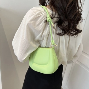 Sac bandoulière en cuir vert fluo en forme de pois avec détail de nœud décoratif