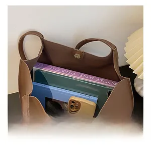 Top view of large brown tote bag showing spacious interior with magnetic snap closure