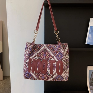 Ethnic knit tote bag with geometric patterns, red leather straps, and Hooto logo