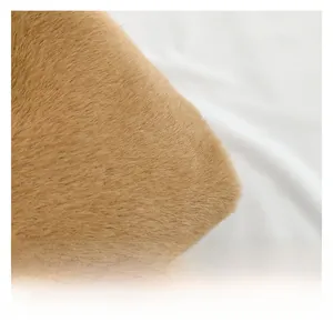 Detailed view of high-density faux fur texture in warm camel for plush bucket bags