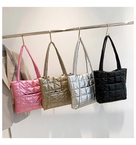 Quilted tote bags with metallic luster finish in pink, gold, silver, and black colors