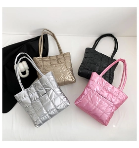 Detailed grid layout of quilted satin tote bags in silver gold black and pink colors