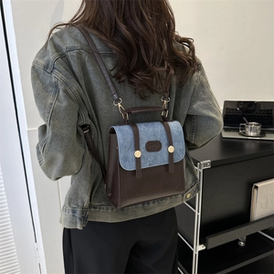 French vintage style small leather backpack with dark brown and blue contrast design