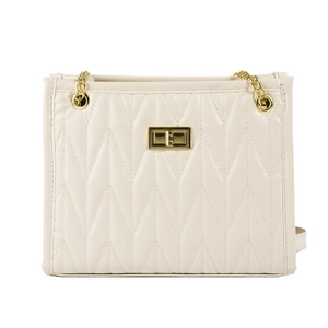 Elegant cream quilted chain shoulder bag with golden metallic twist lock on white background
