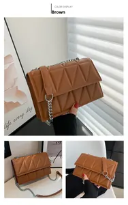 Detail of brown crossbody bag featuring triangular quilted pattern and silver chain strap