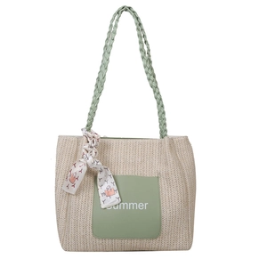 Minimalist beige woven straw tote bag with summer patch and floral silk scarf detail