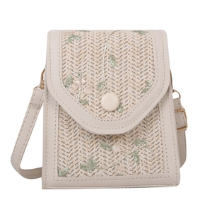 Straw woven crossbody phone bag with floral embroidery and adjustable strap