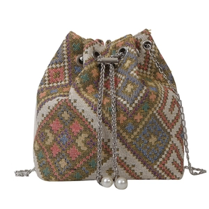 Ethnic geometric tapestry bucket bag with pearl drawstring and silver chain strap