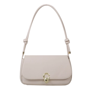 Minimalist beige underarm bag in faux leather with a golden C-shaped buckle and knot strap