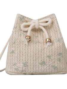 Straw drawstring bucket bag with floral embroidery and white cotton rope handles