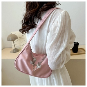 Pink crescent underarm bag featuring a delicate silver butterfly metal chain detail