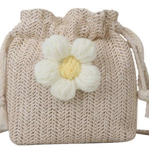 Handmade woven bucket bag for women with large floral detail and drawstring closure
