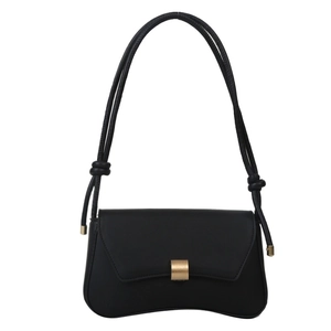 Elegant black baguette underarm bag with a curved base and golden metal lock hardware