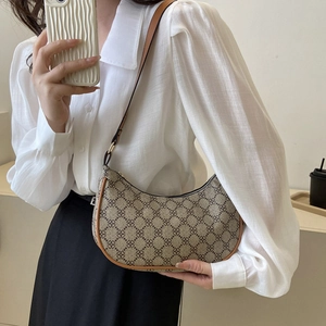 French vintage hobo bag with geometric pattern and brown leather strap for women
