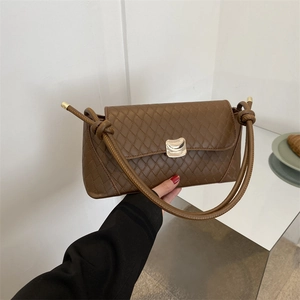 Brown quilted PU leather baguette bag with gold metal buckle and knotted shoulder strap