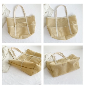 Detail view of beige mesh tote bag with multiple pockets and breathable fabric texture