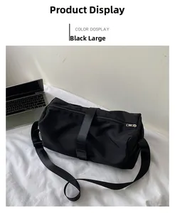 Close-up of a large black nylon fitness bag with durable straps and metallic zippers
