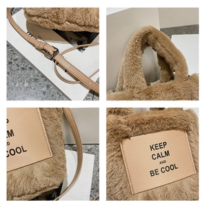Detail view of brown plush bucket bag with adjustable leather strap and cozy faux fur texture