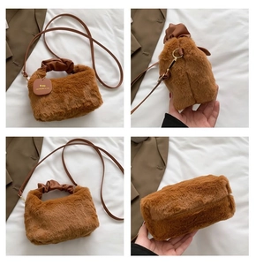 Detail view of the brown plush shoulder bag showing textured faux fur and strap
