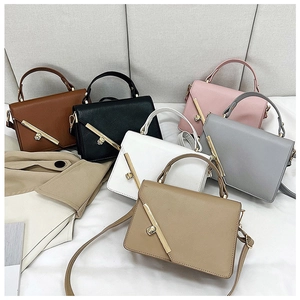 Detailed collection of 6 textured leather crossbody bags with golden diagonal metal bars