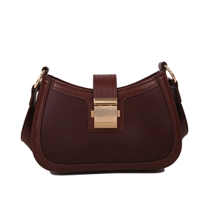 Vintage dark brown leather half-moon shoulder bag with golden buckle and sleek design