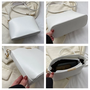 Detailansicht der weißen PU-Leder Umhängetasche mit goldener Hardware und Innenraum