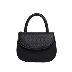Classic black quilted leather saddle bag with top handle and elegant flap closure