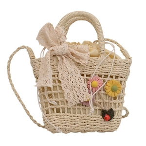 French straw woven bucket bag with lace bow and floral charms for summer vacation
