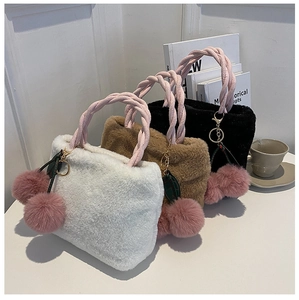 Detailed plush bucket bags in white, brown and black with soft faux fur and braided handles