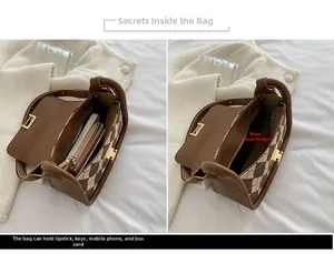 Detailed view of plaid saddle bag interior capacity with phone and cosmetics