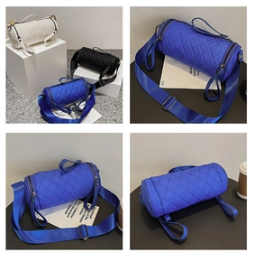 Detailed view of quilted nylon barrel bags with adjustable wide shoulder straps