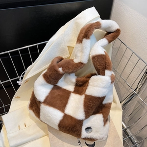 Chic brown and white checkered faux fur handbag with soft texture and silver buckle detail
