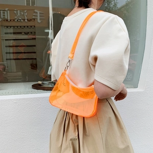 Modern neon orange transparent PVC shoulder bag with silver metal chain and webbed strap