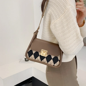 Retro plaid saddle bag featuring brown leather trim and a golden buckle for women