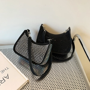 Sparkling rhinestone crescent shoulder bags in black and silver finishes for women