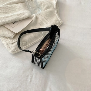 Sparkling sequin baguette bag in black leather with silver rhinestones and chain strap