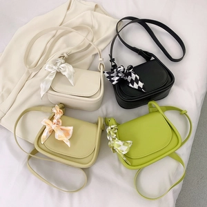 Mini crossbody saddle bags in candy colors with decorative silk scarves and matte PU leather