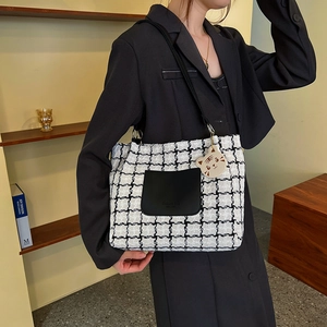 Large capacity black and white tweed tote bag with leather pocket and cat charm detail