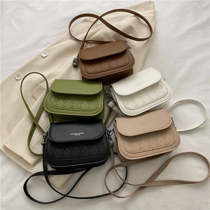 Minimalist crossbody flap bag in multiple colors featuring quilted texture and fashion logo