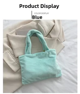 Close-up of soft faux fur texture and top handles on mint blue plush tote bag