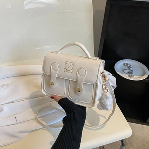 Retro cream white crossbody bag with bear embroidery and gold rivets on camera bag style