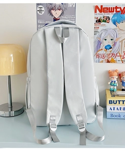Light gray backpack back view showing adjustable wide straps and side storage pockets