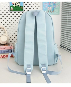 Rear view of light blue backpack featuring padded adjustable straps and side drawstring pockets