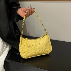 Fashionable yellow ostrich textured crescent bag with gold chain strap for women