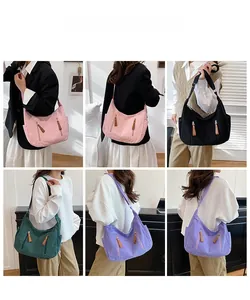 Detail shots of corduroy crossbody bags in various colors on models for size reference