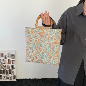 Retro floral canvas tote bag with natural bamboo handles and spacious square design