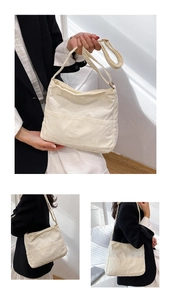 Detailed corduroy texture and front pocket of the minimalist beige crossbody bucket bag