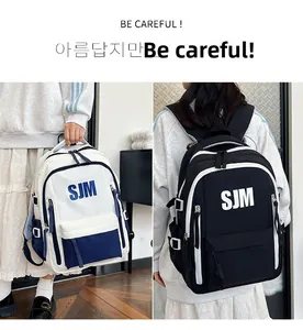 Detail view of large capacity school backpacks in blue-white and black-white contrast colors